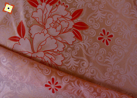 Le tissu piquant de matelas orange tissé déforment l'impression de tricotage