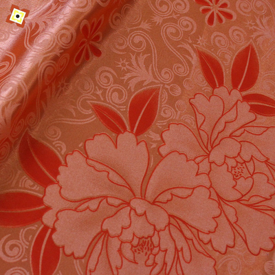 Le tissu piquant de matelas orange tissé déforment l'impression de tricotage