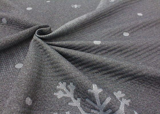 le jacquard 100% fin de polyester a tricoté le modèle de flocon de neige de tissu de matelas