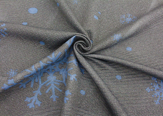 le jacquard 100% fin de polyester a tricoté le modèle de flocon de neige de tissu de matelas