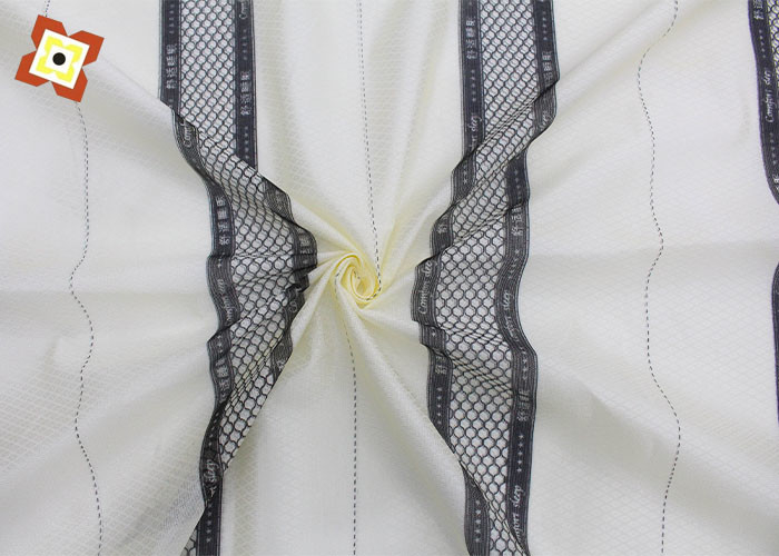 La chaîne imprimée par couleur de tissu de protecteur de matelas de Pengji de polyester a tricoté